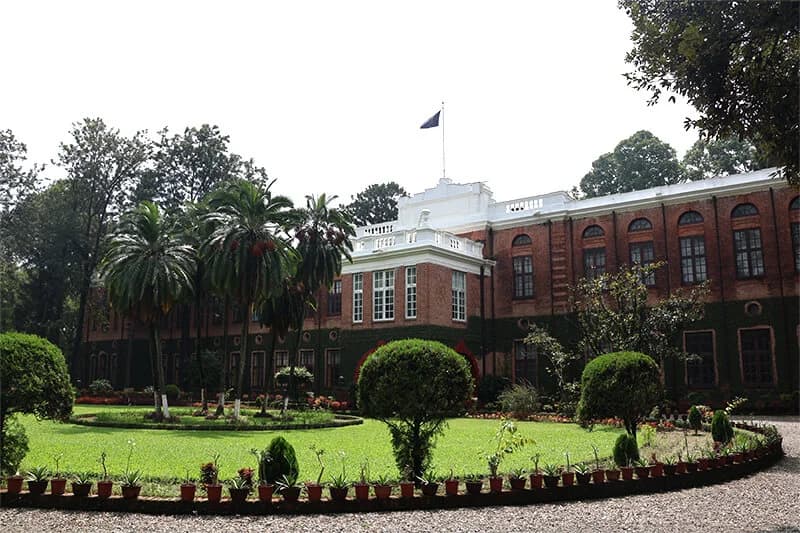 The Main Building beyond its green front lawn